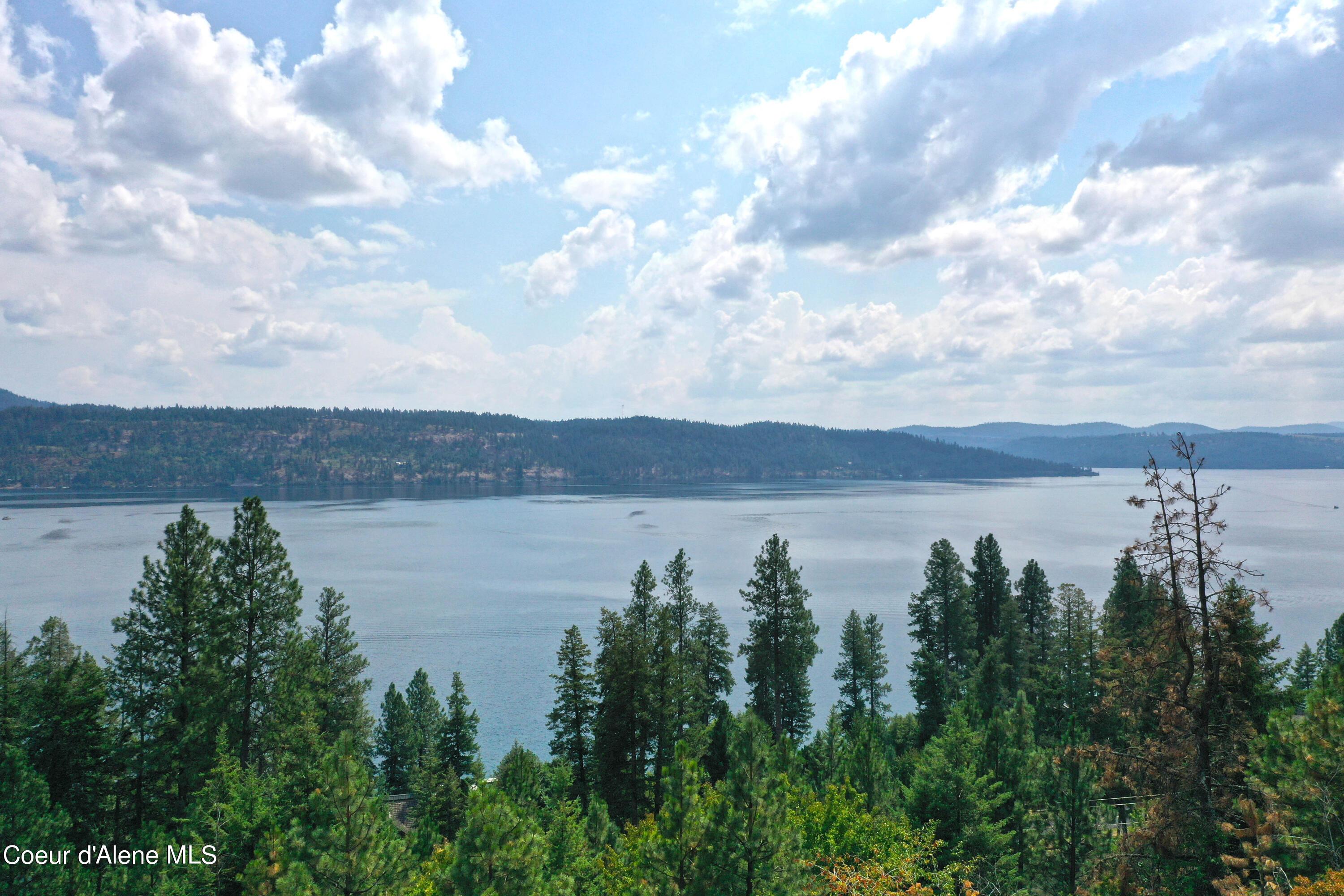 Image 2: Unobstructed 180-Degree Lake Views