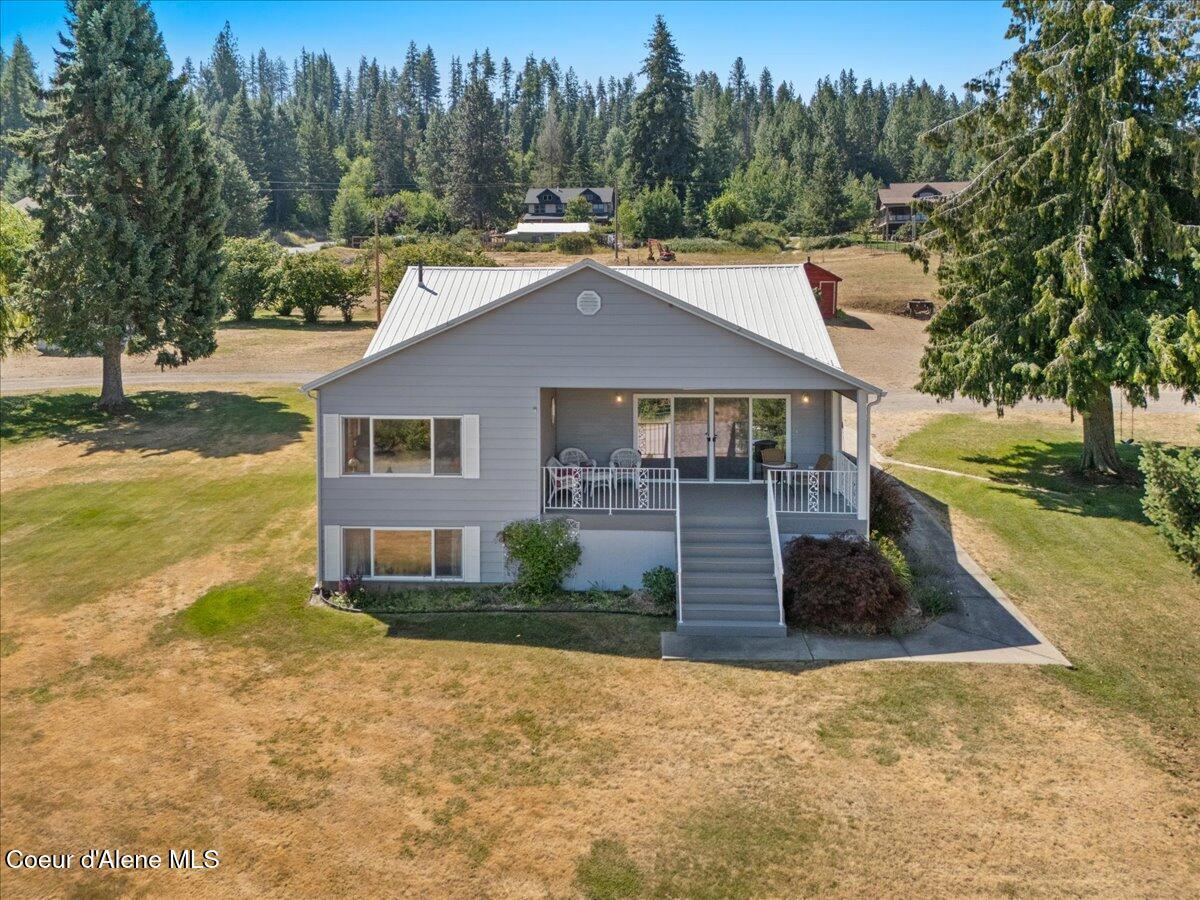 Image 1: 60-Aerial back of home