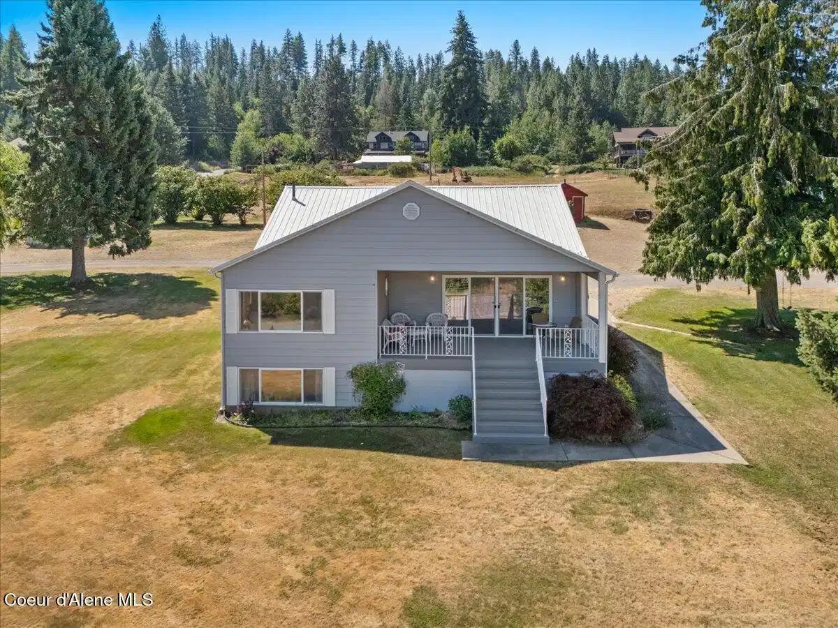 Image 1: 60-Aerial back of home