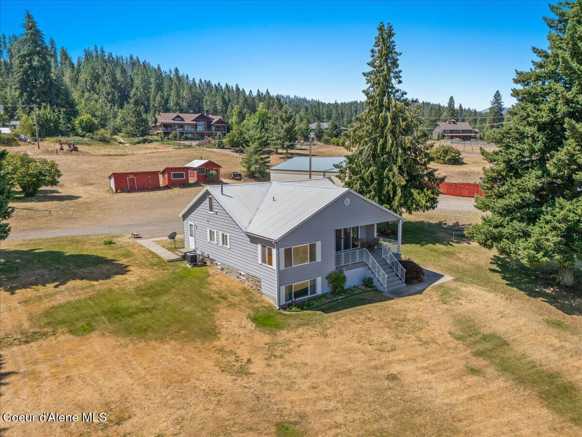 Image 3: 61-Aerial back of home