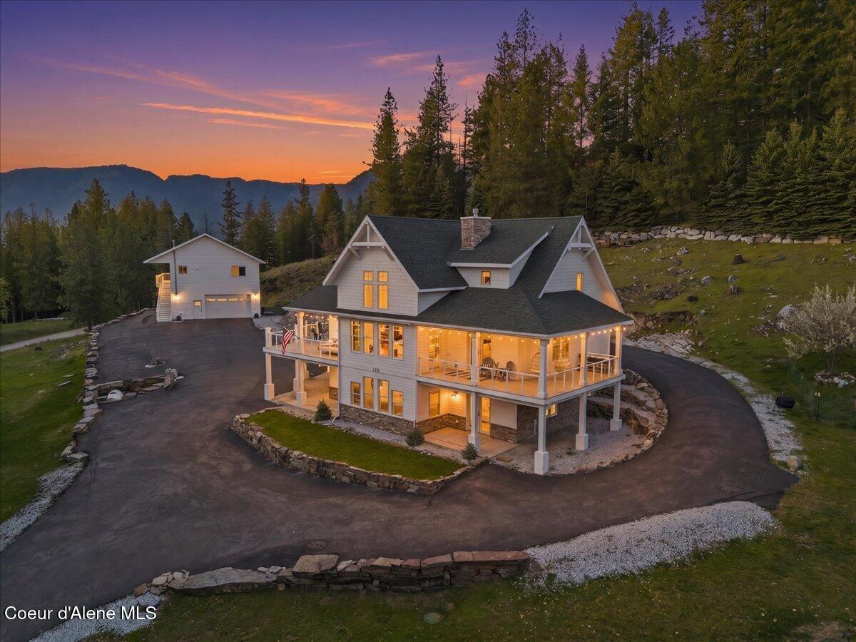 Image 2: 116-Twilight Aerial Back of Home