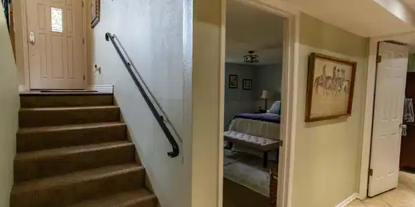 Image 3: To front door from lower level and lower