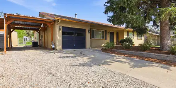 Image 3: Attached Garage & Carport