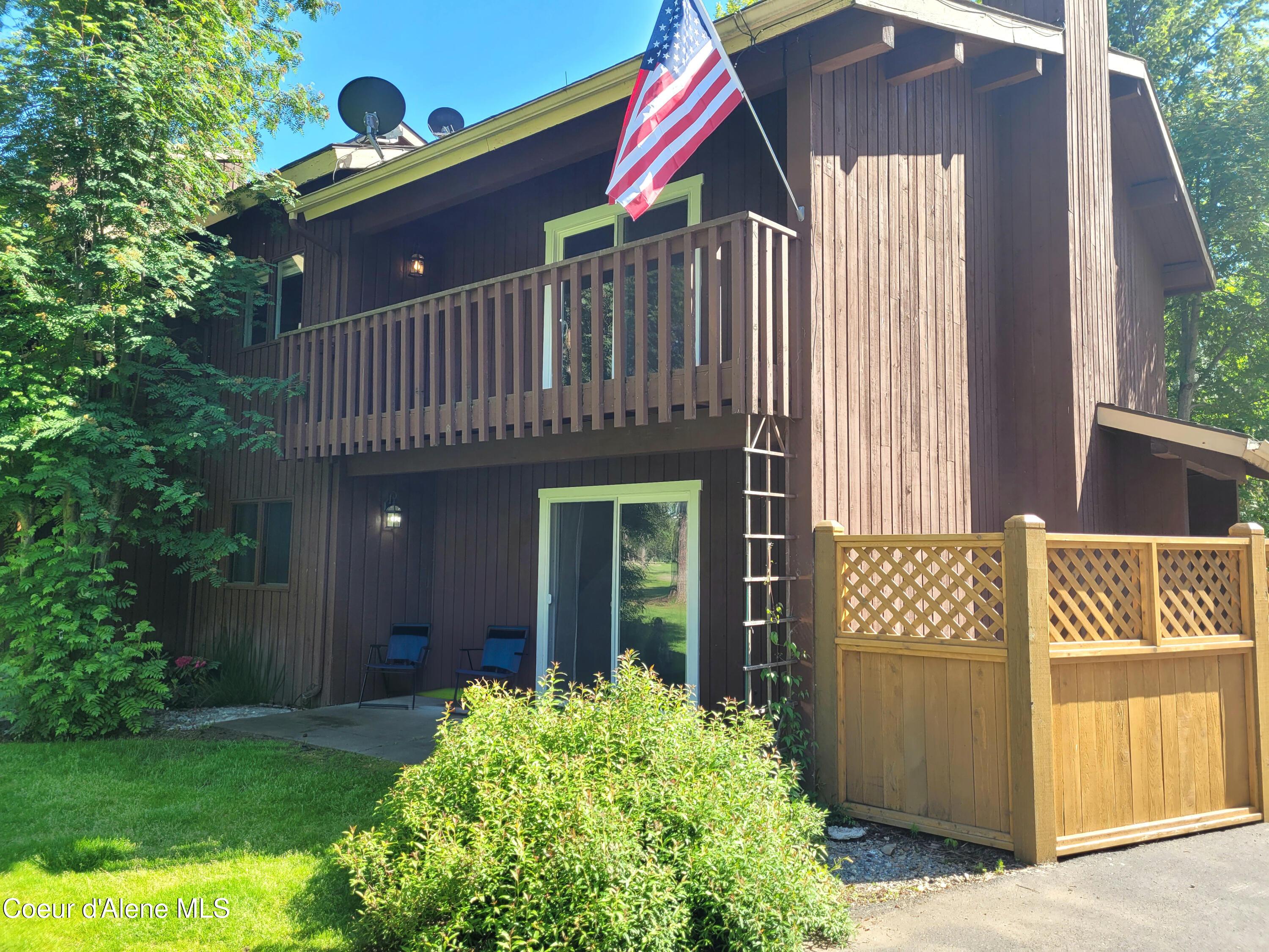 Image 1: Backside of 2-story Condo