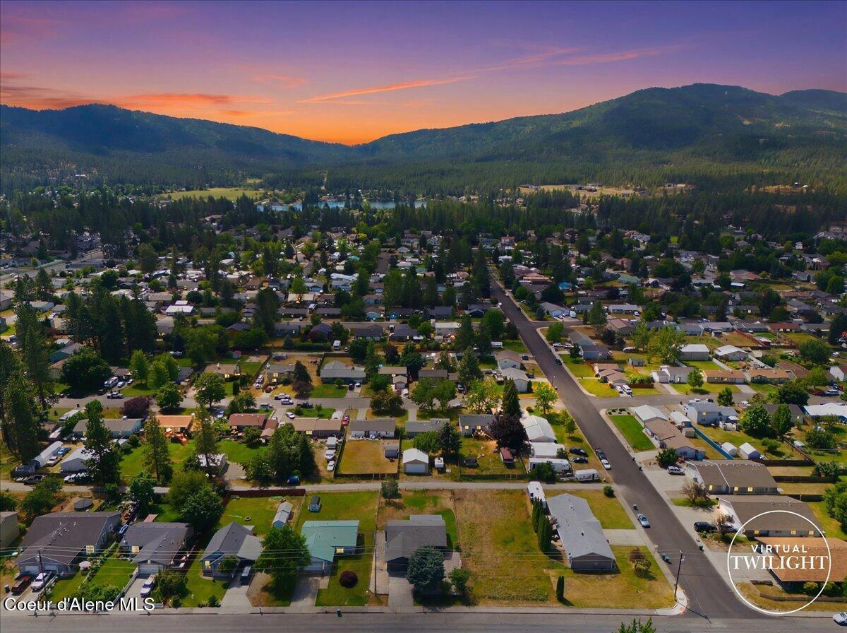 Image 2: 01-Twilight Aerial Front of Home waterma