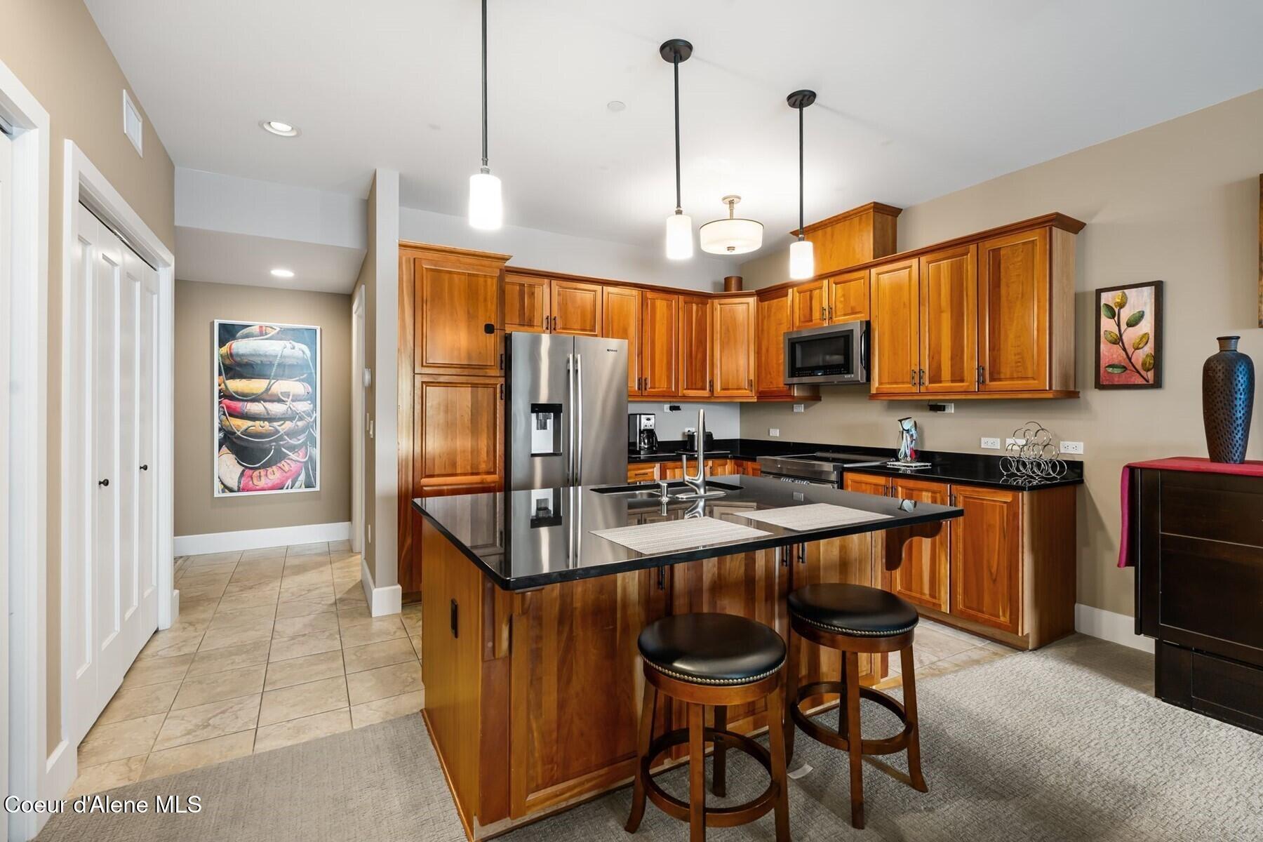 Image 3: Open Kitchen with Breakfast Bar