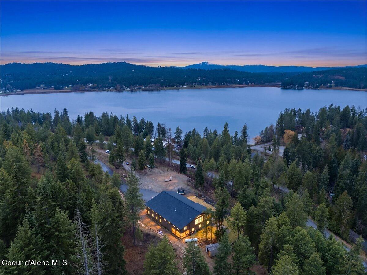 Image 1: 01-Twilight Aerial Back of Home