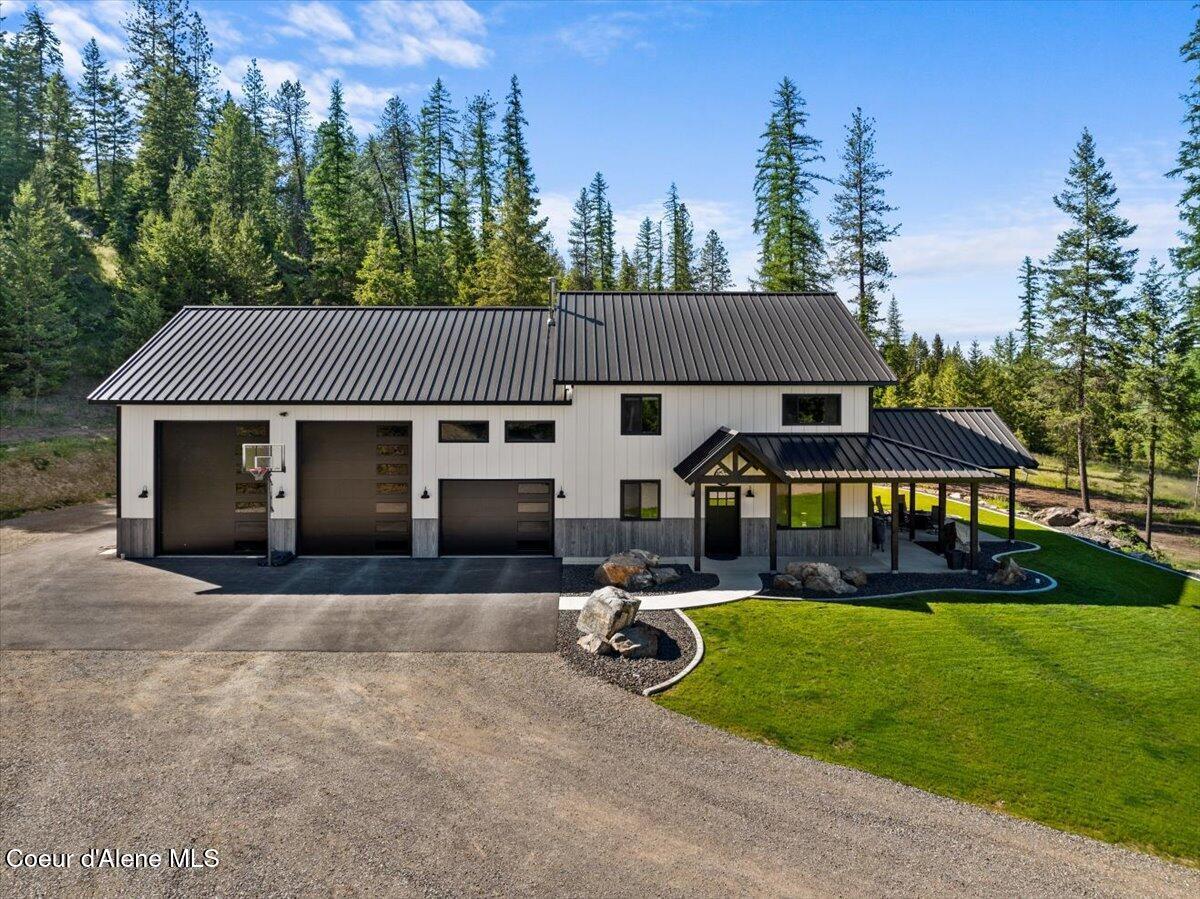 Image 2: 03-Aerial front of home