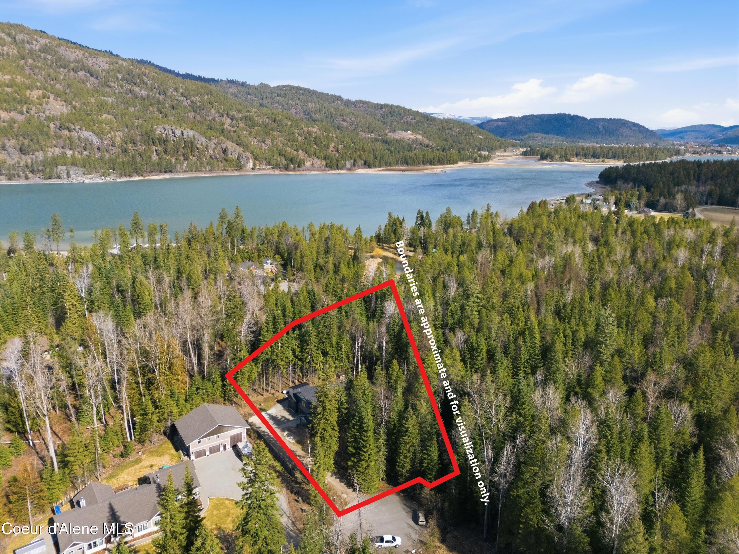 Image 3: 03-Aerial Front of Home