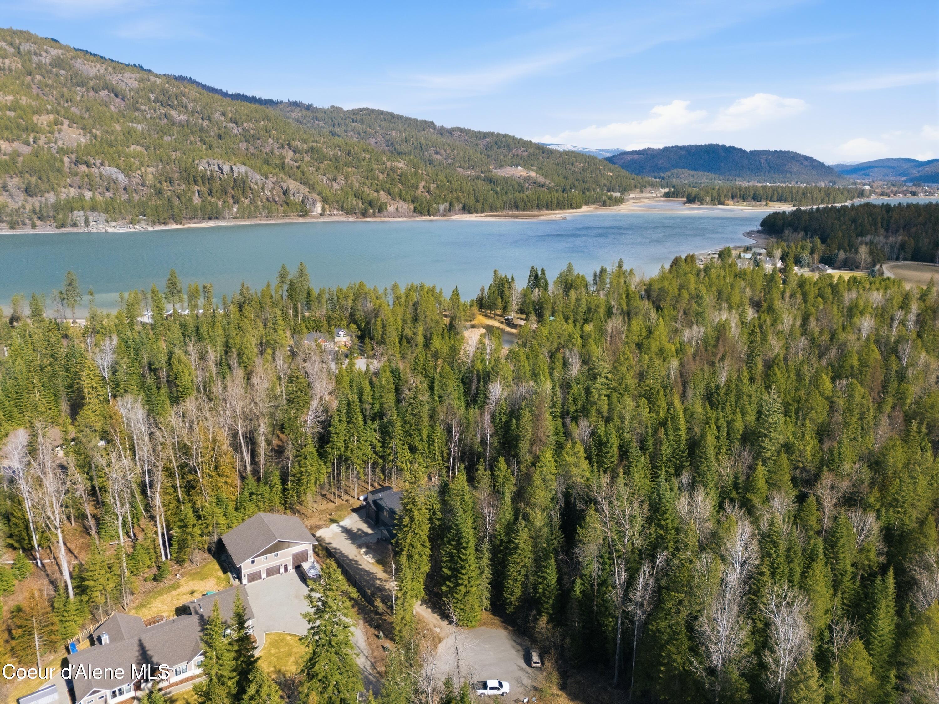 Image 4: 04-Aerial Front of Home