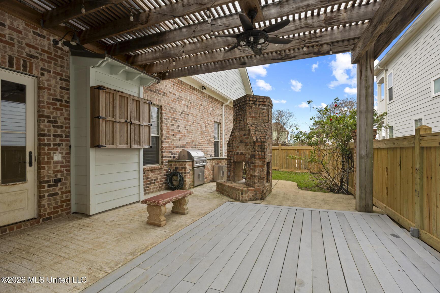 Image 2: Outdoor Kitchen,Dining and F/P