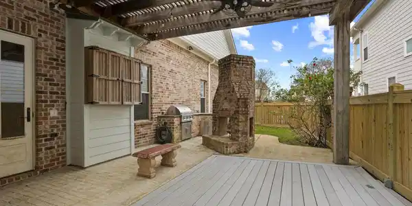 Image 3: Outdoor Kitchen,Dining and F/P
