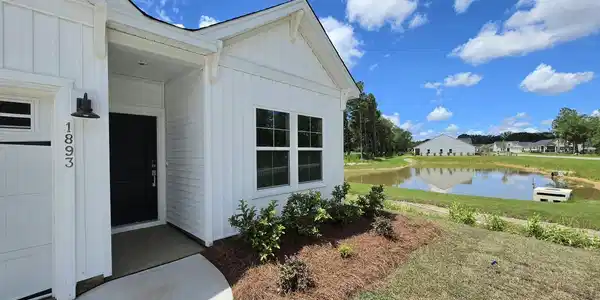 Image 2: Entrance & Pond Lot