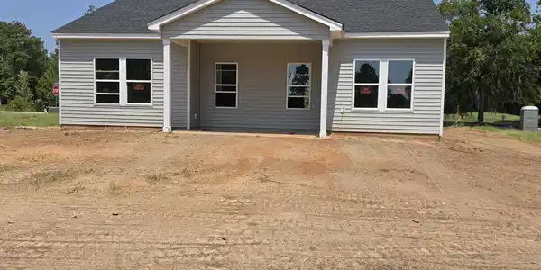Image 2: Rear yard & Covered Porch