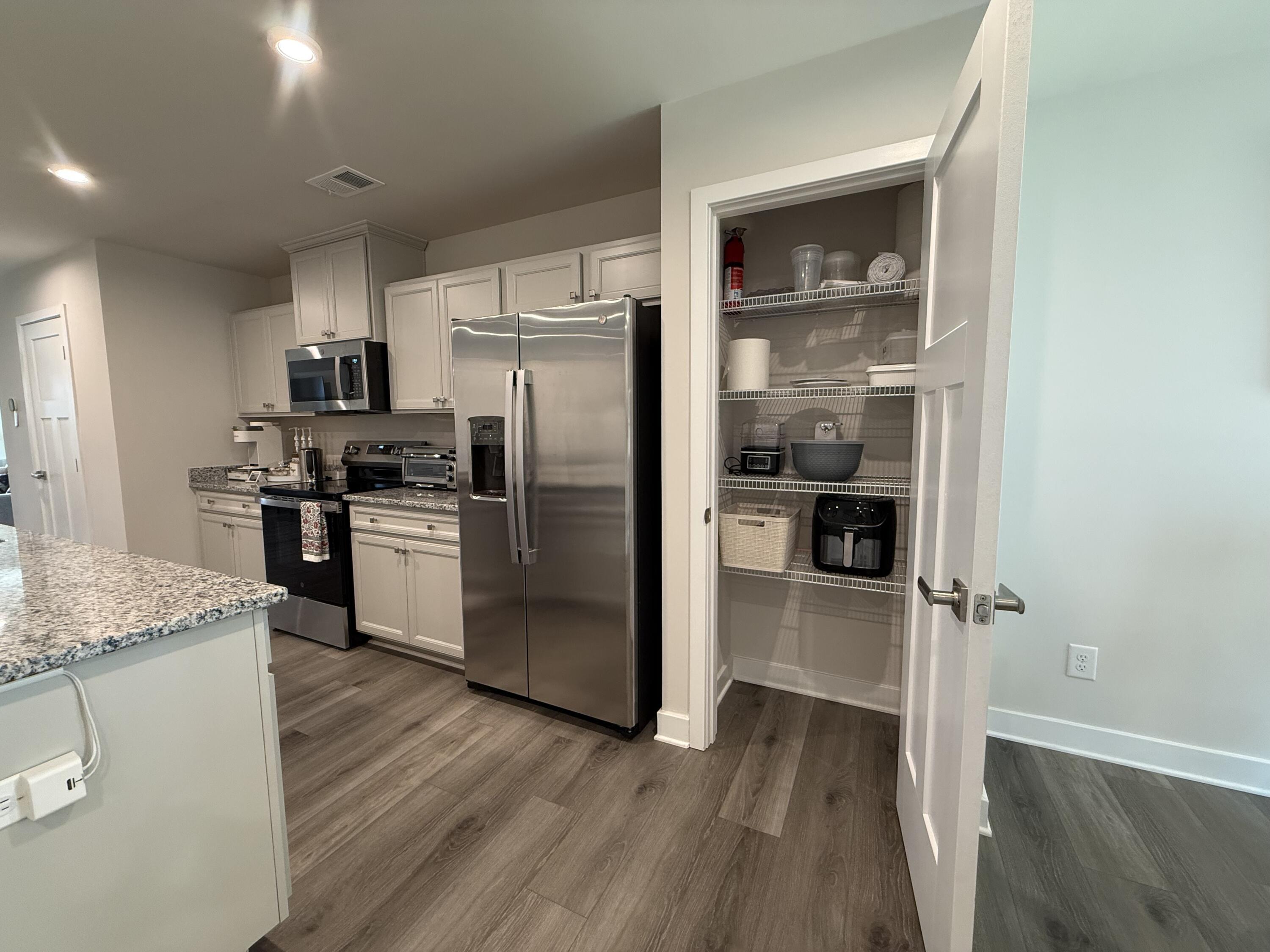 Image 3: Cabinets and pantry