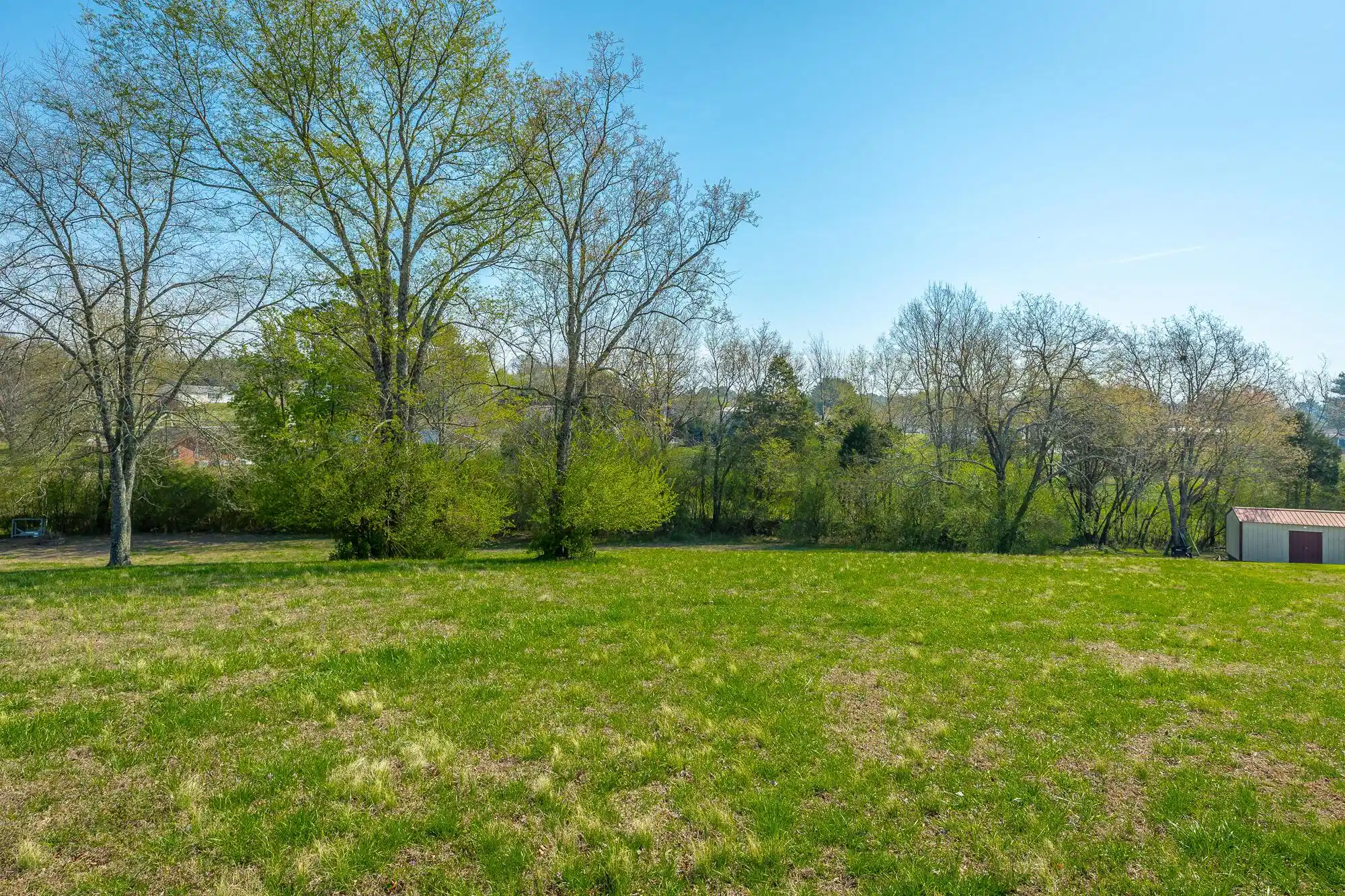 Image 1: Level lot near end of cul-de-sac