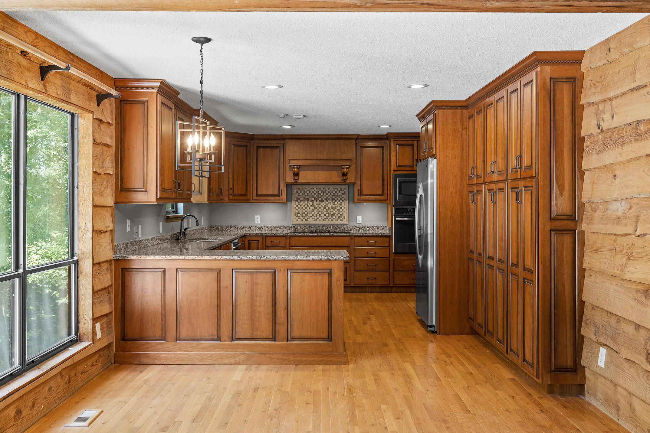 Image 2: kitchen open to living room