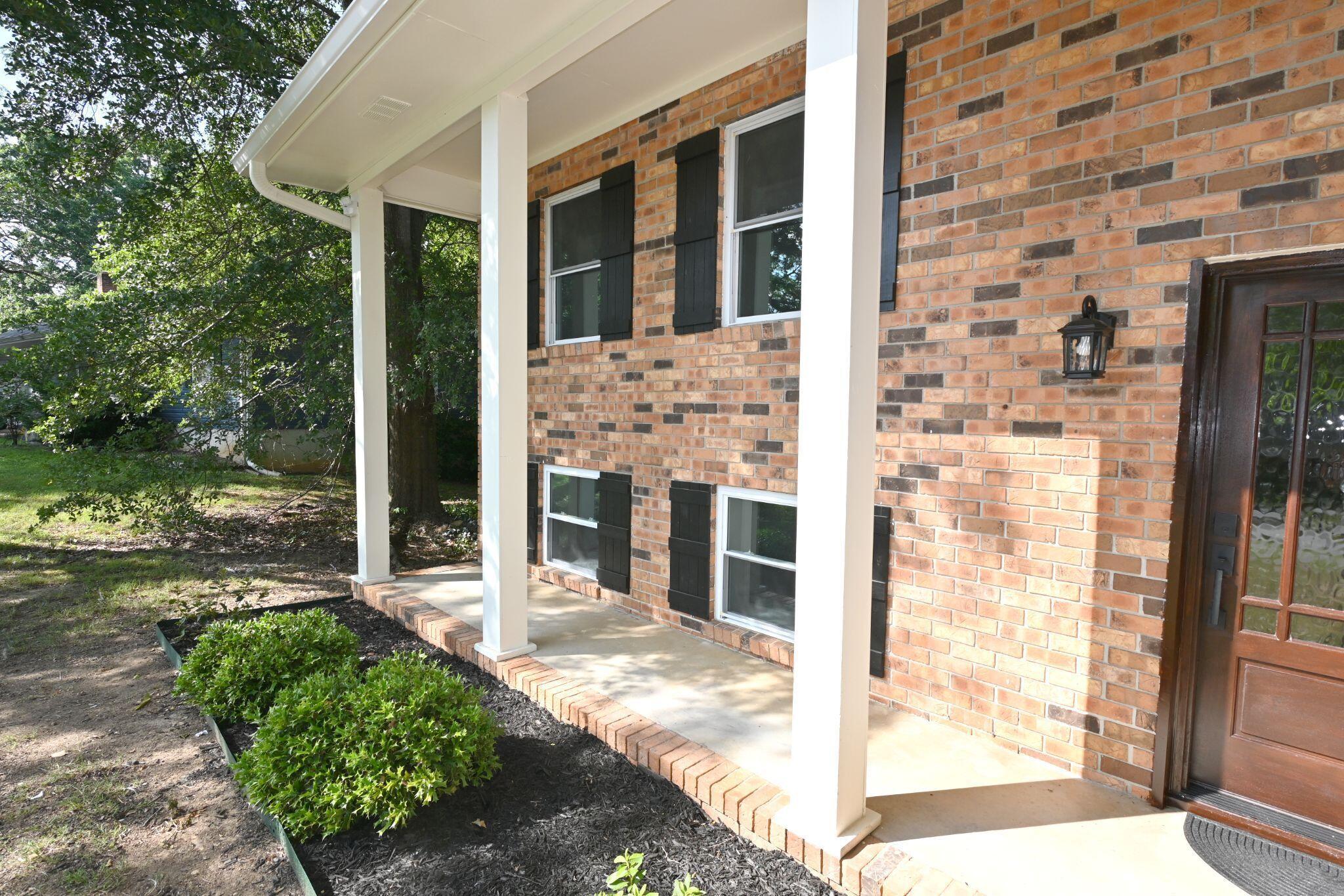 Image 2: Four column covered front porch