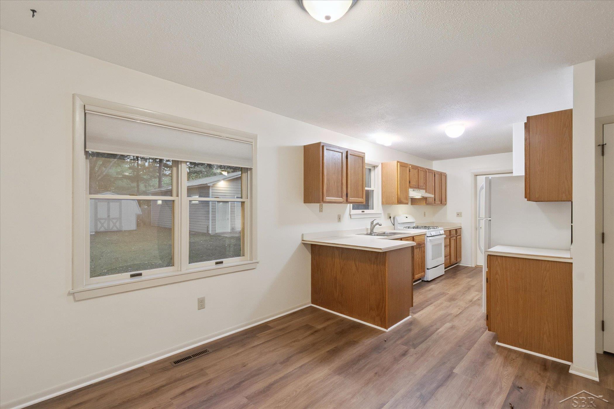 Image 4: Dedicated dining are with view of the back yard