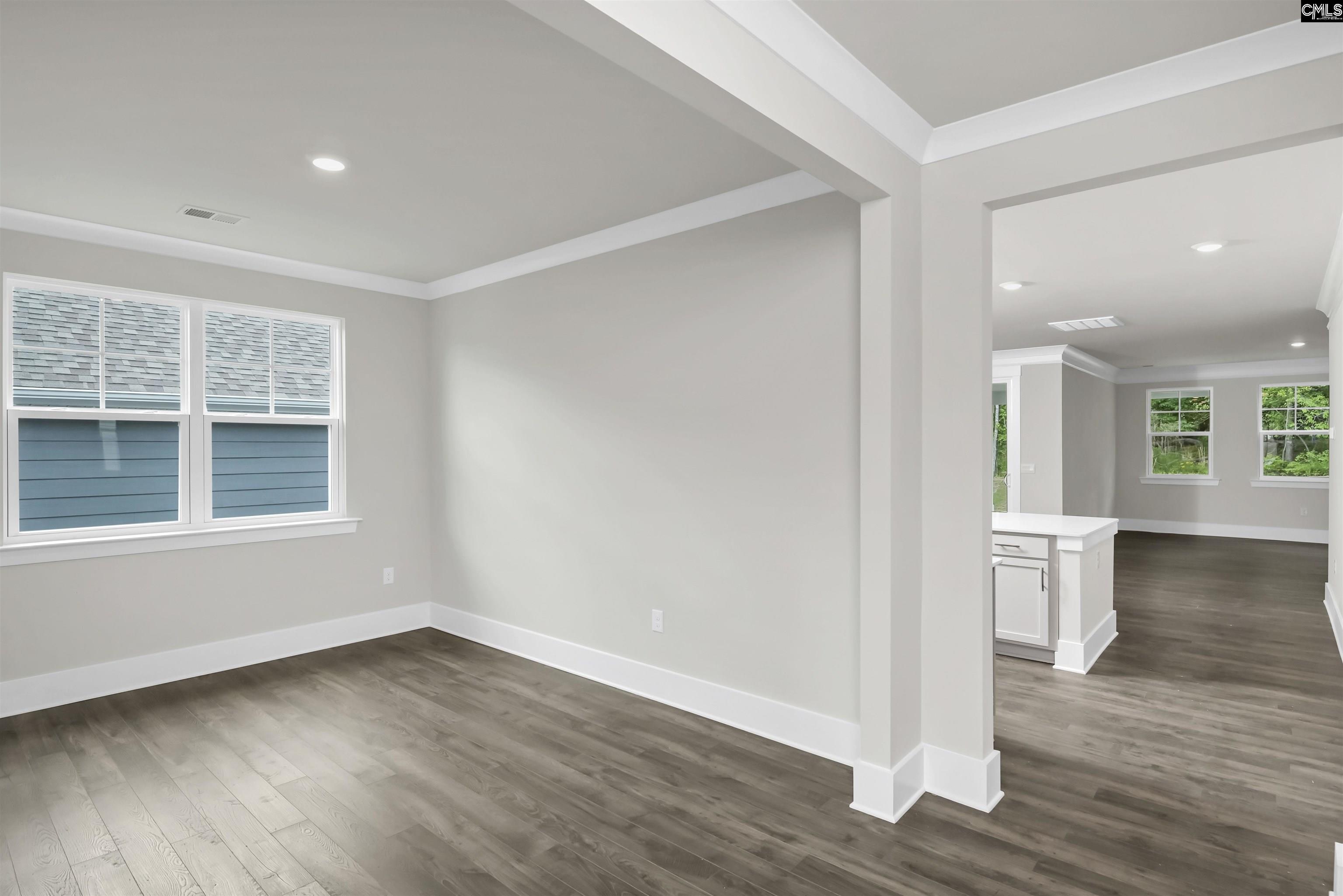 Image 3: Could be used as a formal dining area or office, Flex leads into the kitchen area