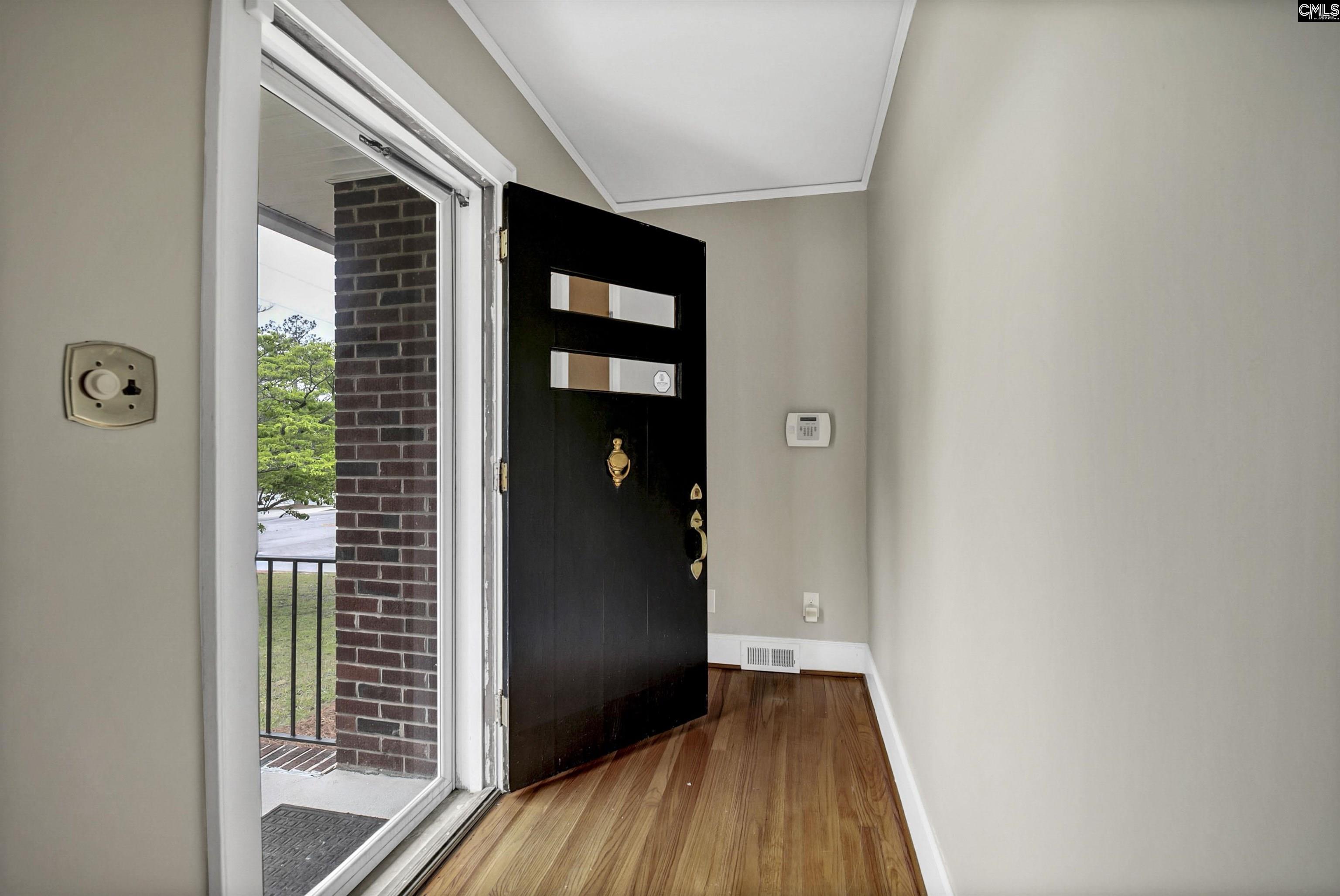 Image 3: Front hall closet and private hallway, Interior Front Entrance and Hallway