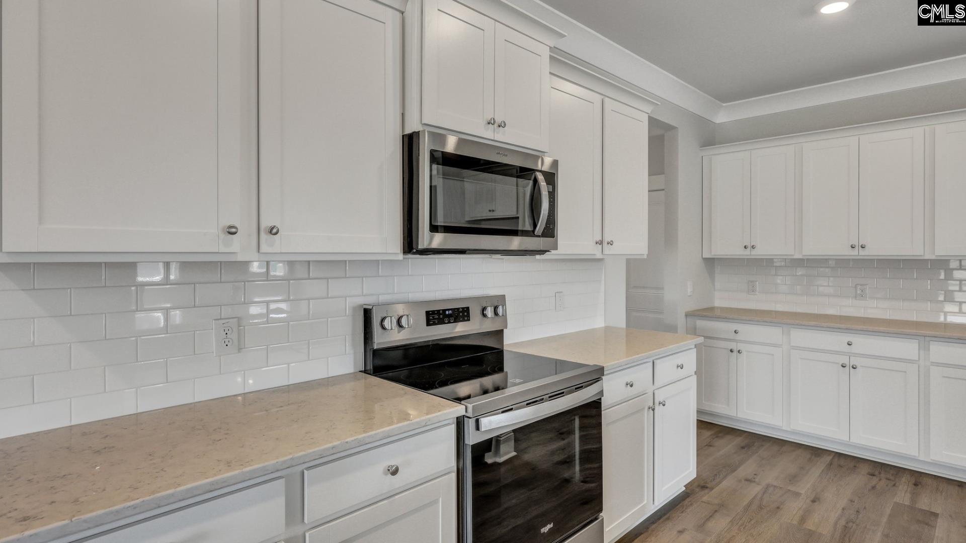 Image 3: *Quartz will be whiter in color, Quartz countertops and tile backsplash
