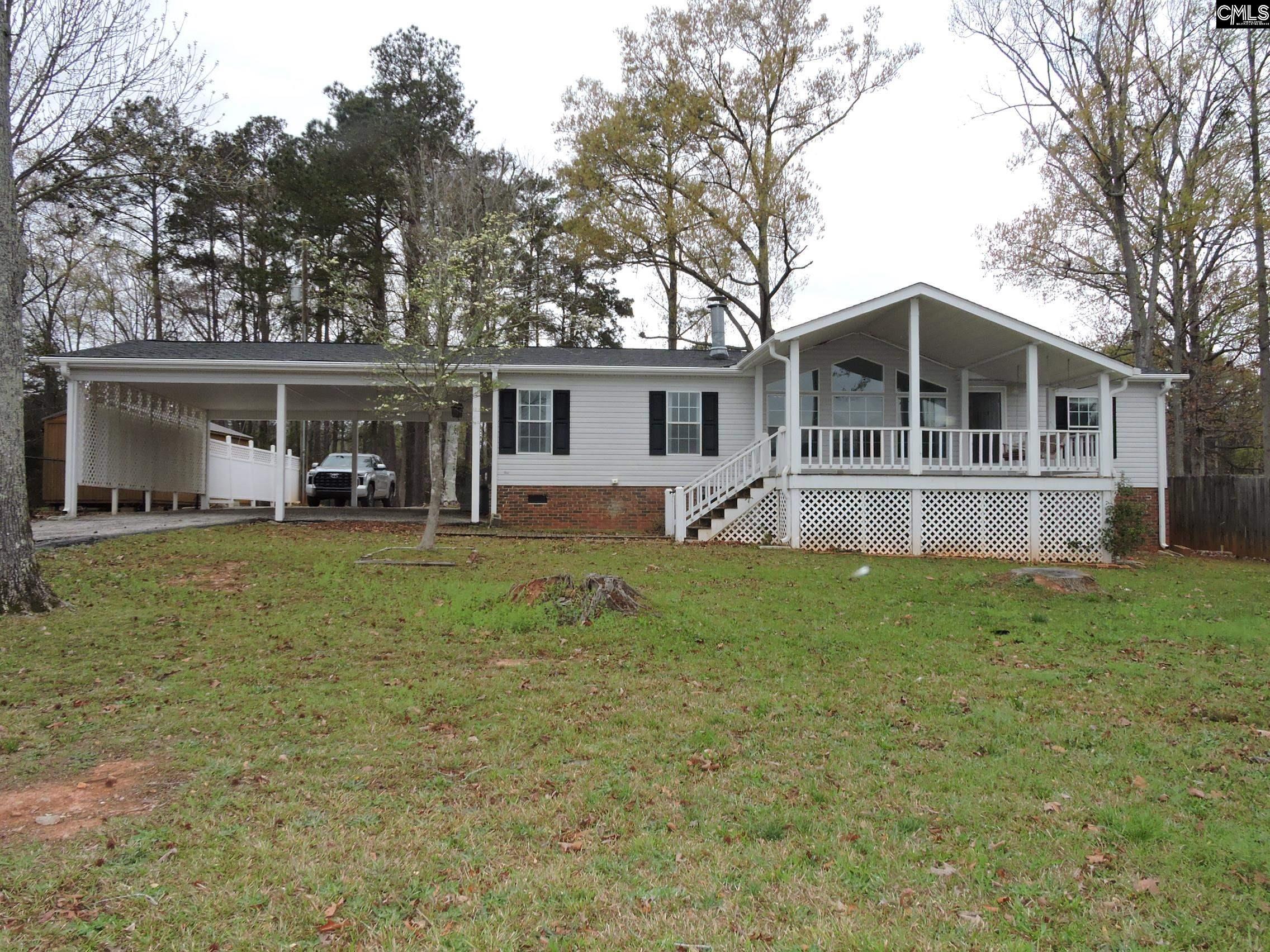 Image 1: VIEW OF HOME FROM WATER