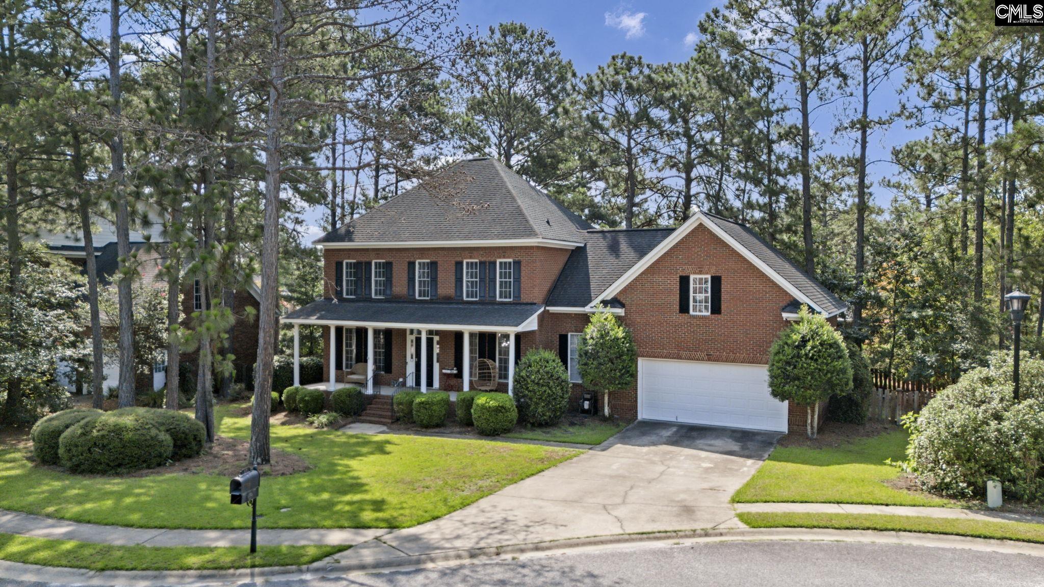 Image 0: Front of house with driveway