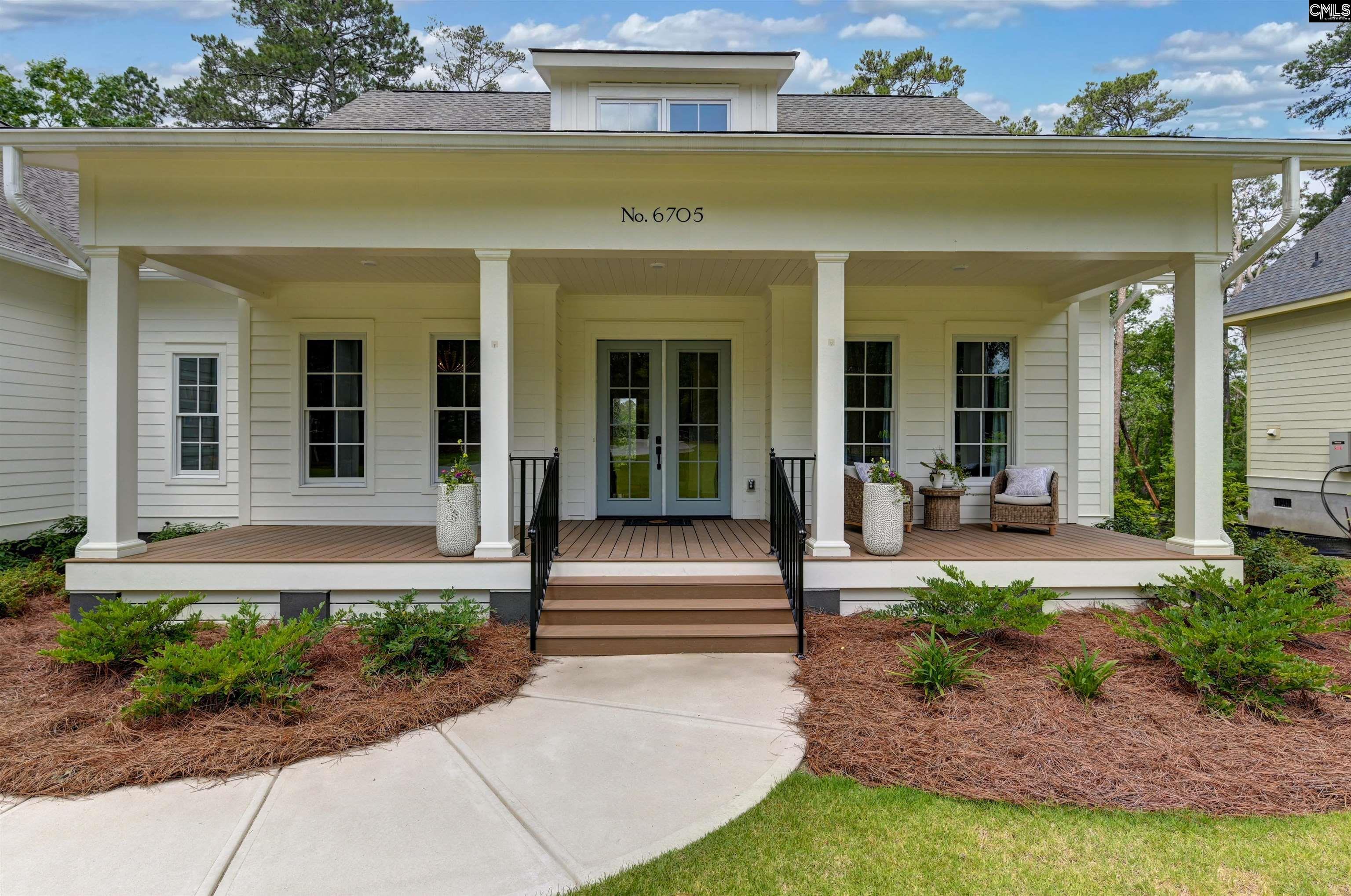 Image 2: What a nice front porch!