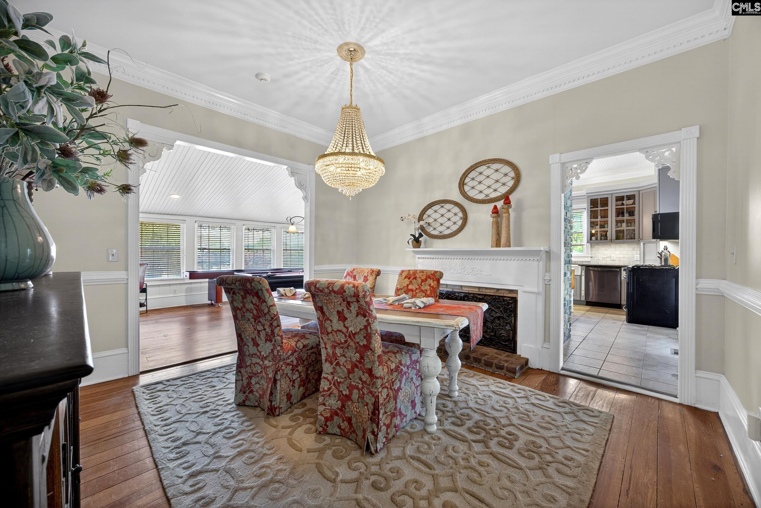 Image 3: Dining Room with Original Hardwood Floors