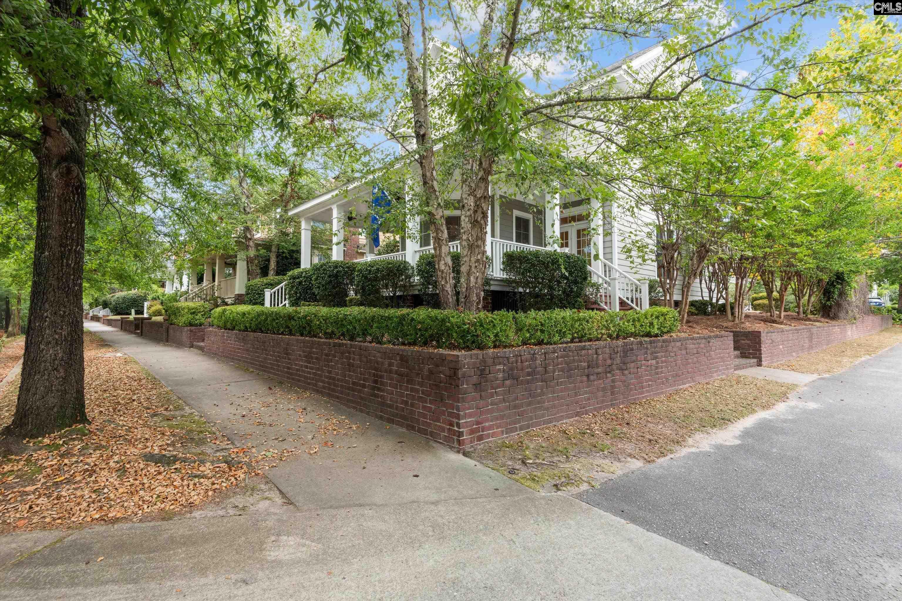 Image 1: The best location in Lake Carolina! Corner lot across from one of the pools