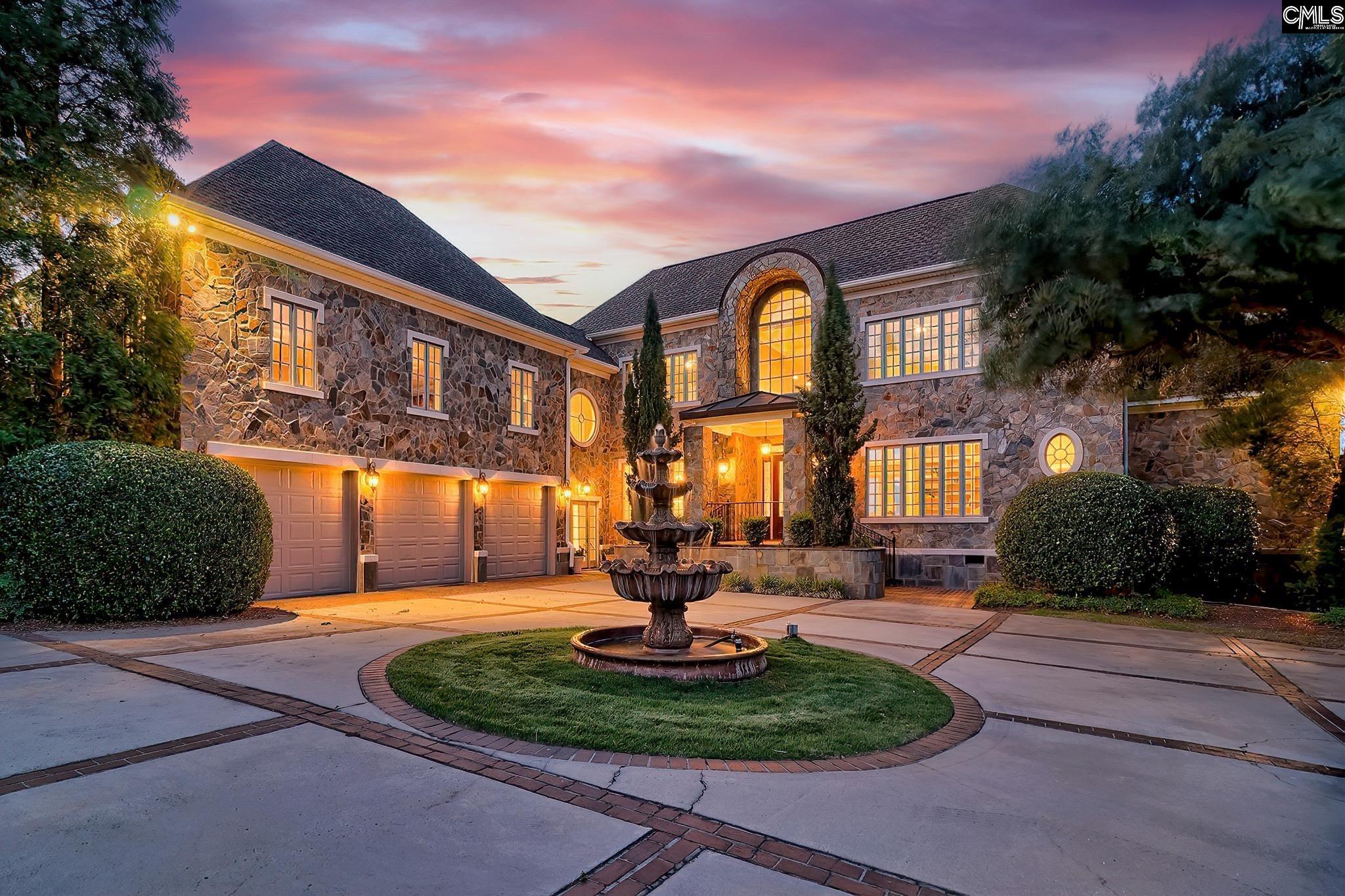 Image 0: Grand Front Entry and Fountain