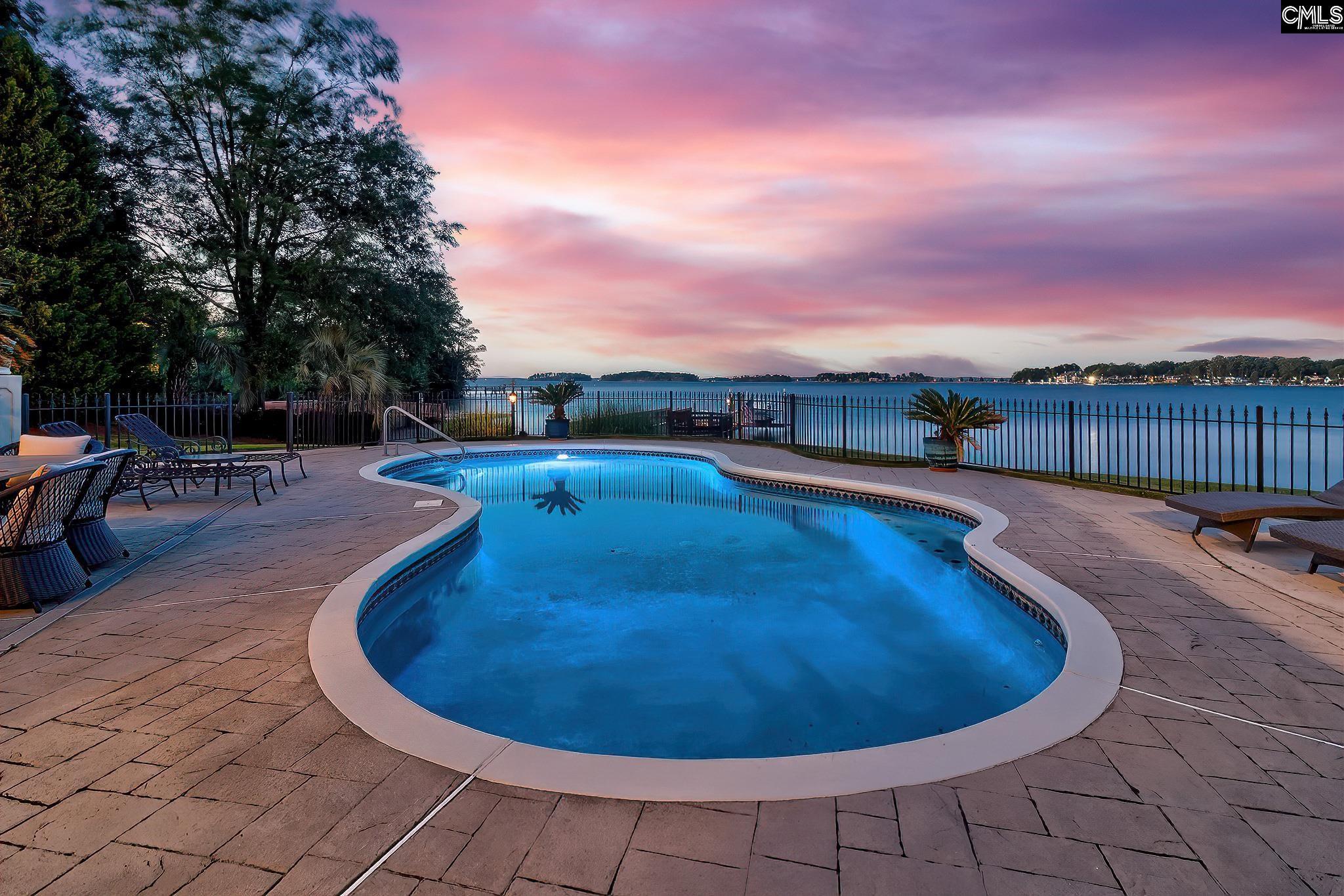 Image 3: Saltwater Gunite Pool with Forever Views
