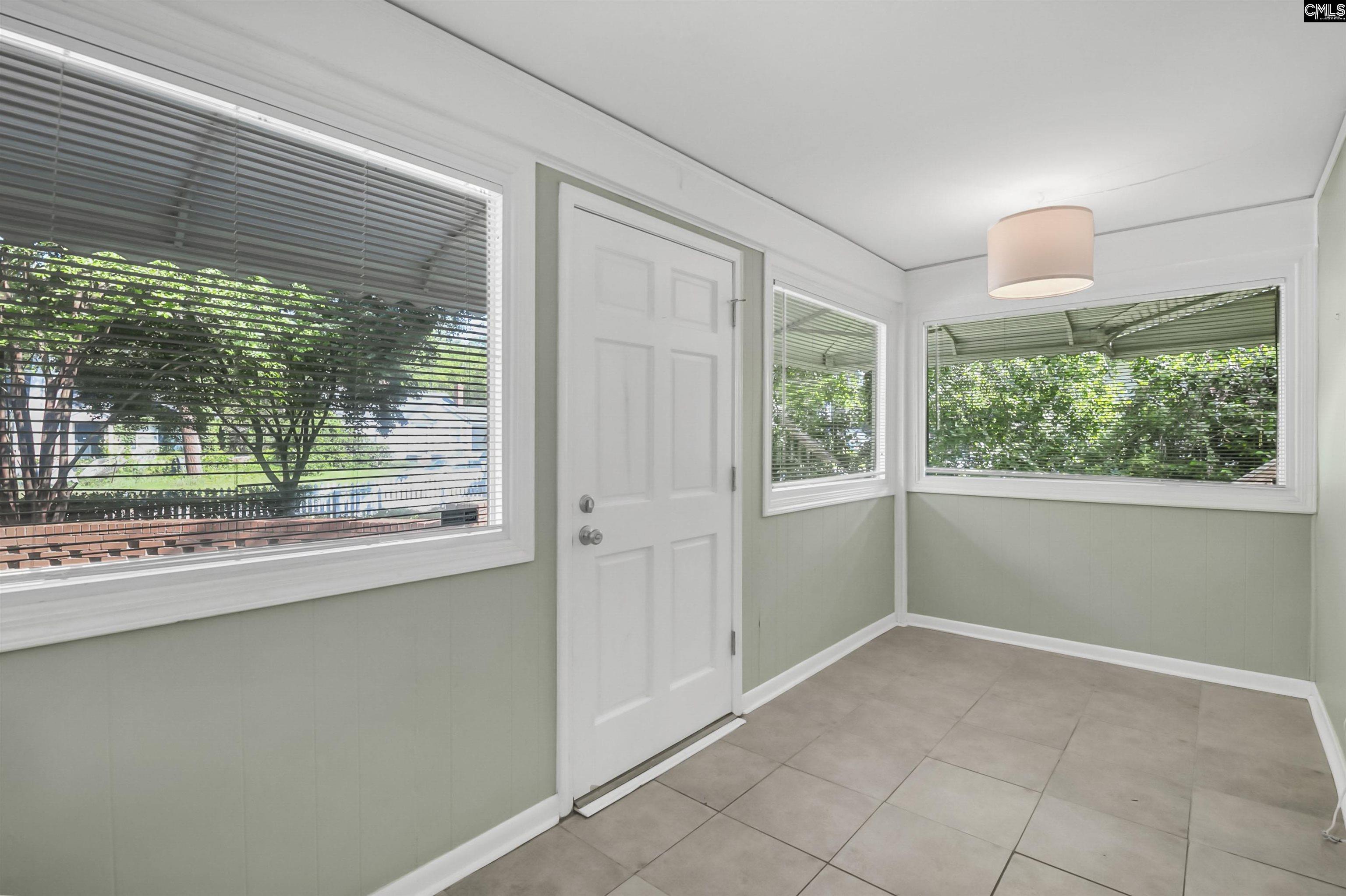 Image 2: Sunroom and Entry