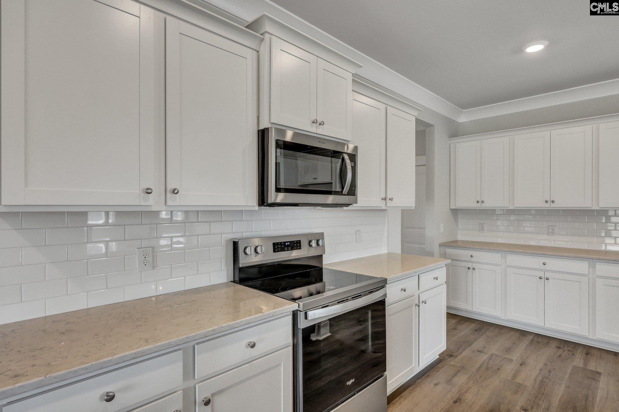 Image 2: *Quartz countertops will be white, Tile backsplash and white cabinetry