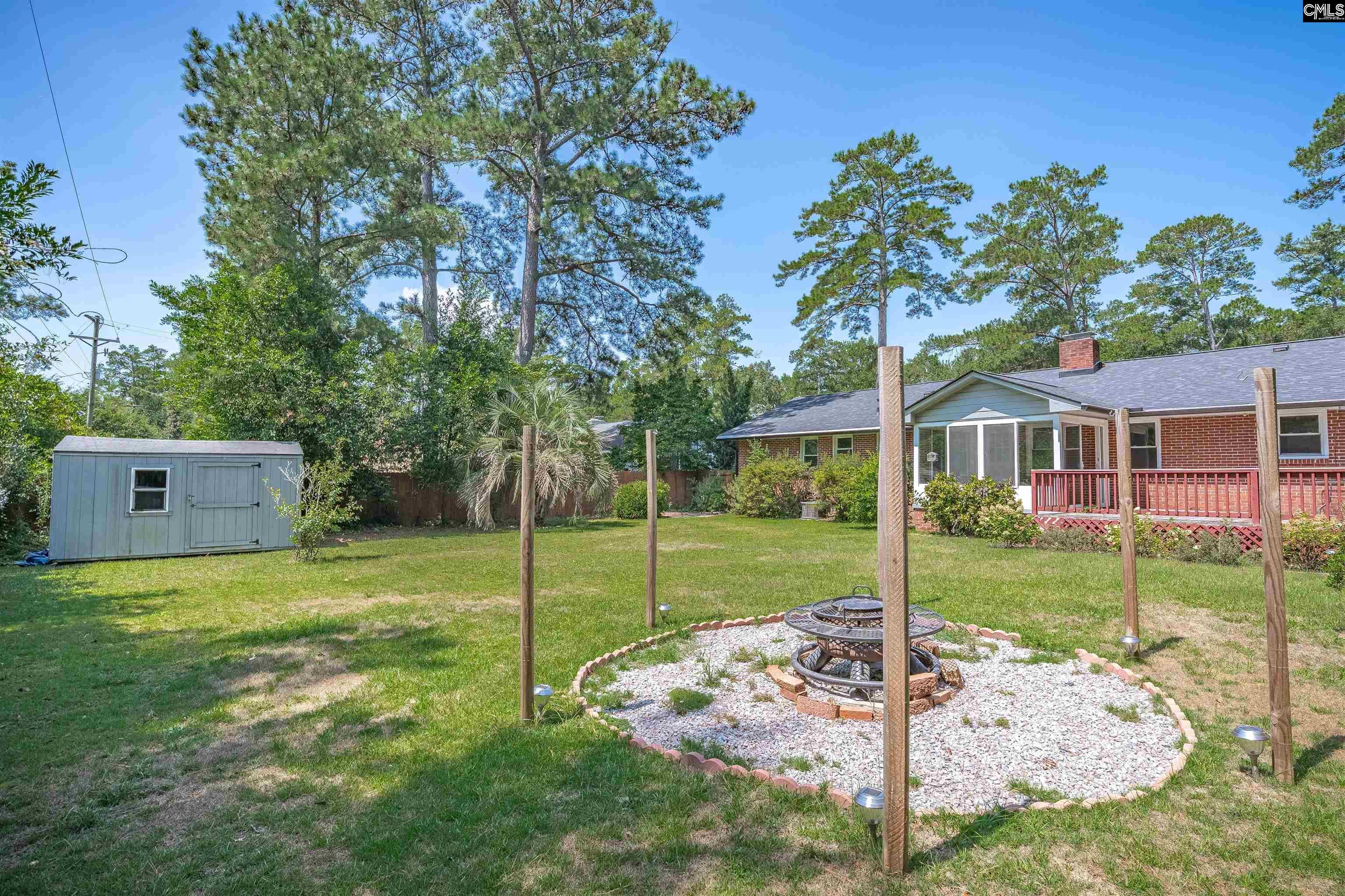 Image 2: Fully Fenced Back Yard With Deck and Fire Pit