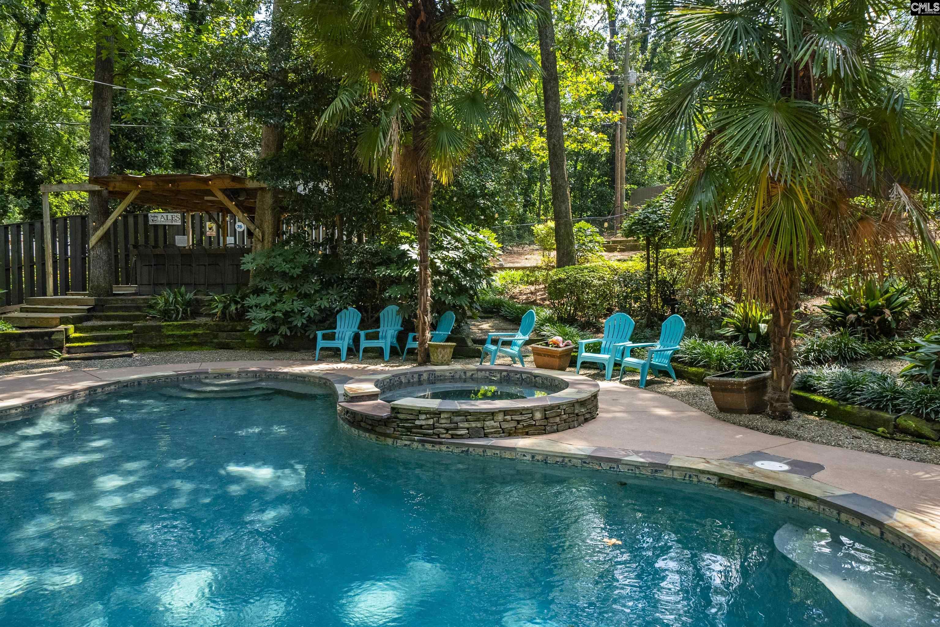 Image 0: Pool, Hot Tub and Tiki Bar