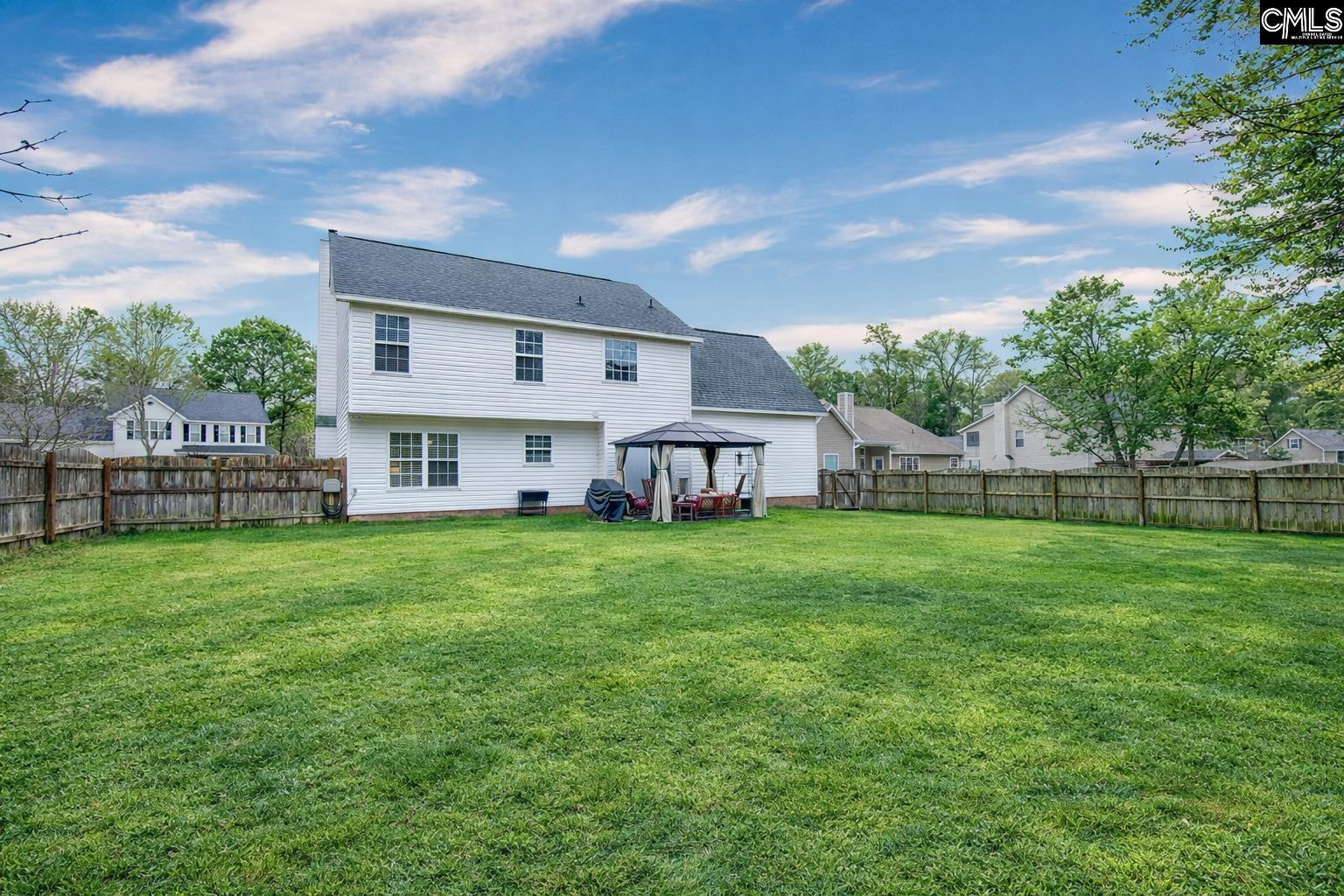 Image 2: Fenced rear yard, gazebo included