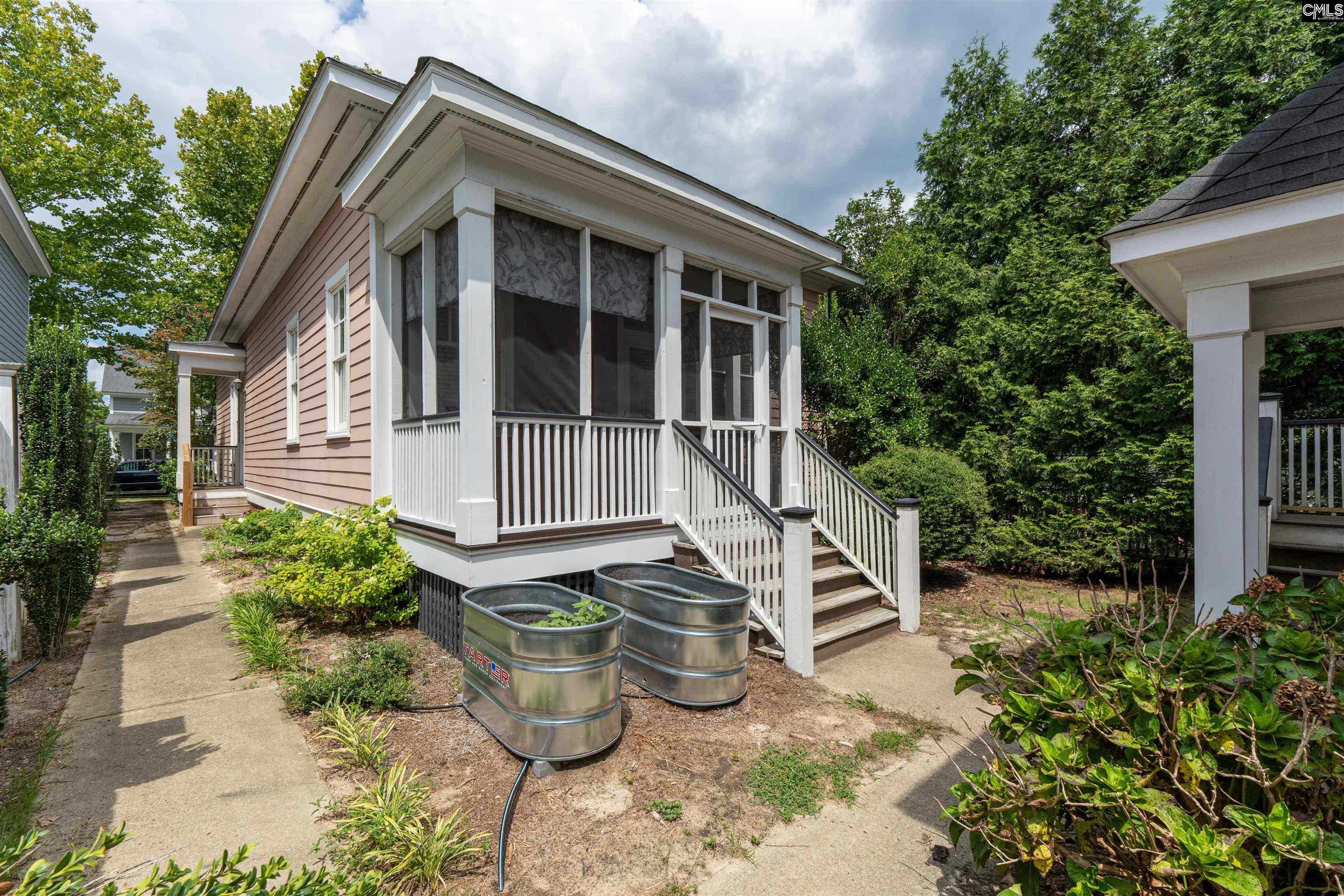 Image 2: Rear view to guest cottage.
