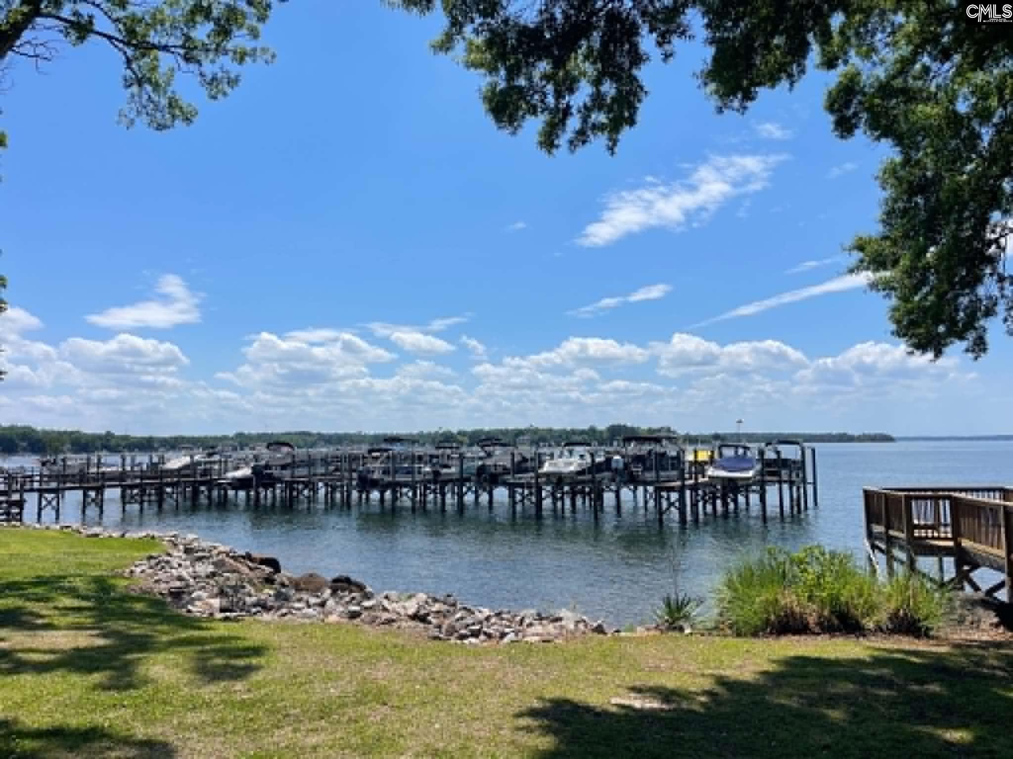 Image 3: Private Marina with Boat Lifts and Ramp!