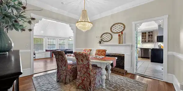Image 3: Dining Room with Original Hardwood Floors