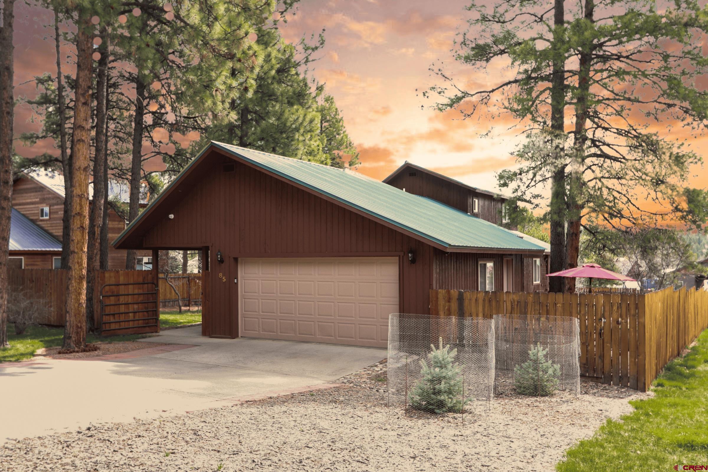 Image 3: Front Exterior and garage