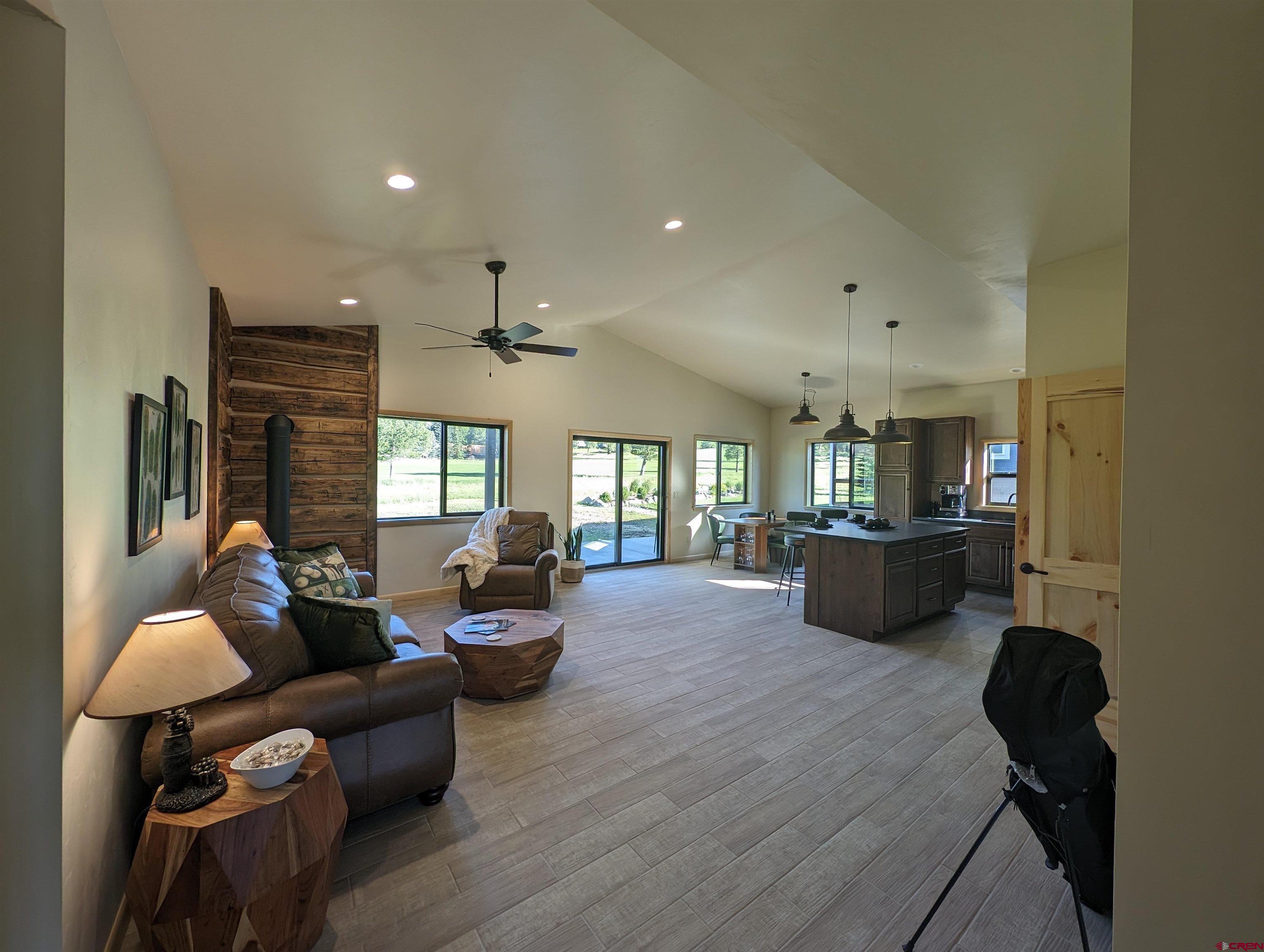 Image 2: wood look tile flooring throughout this home