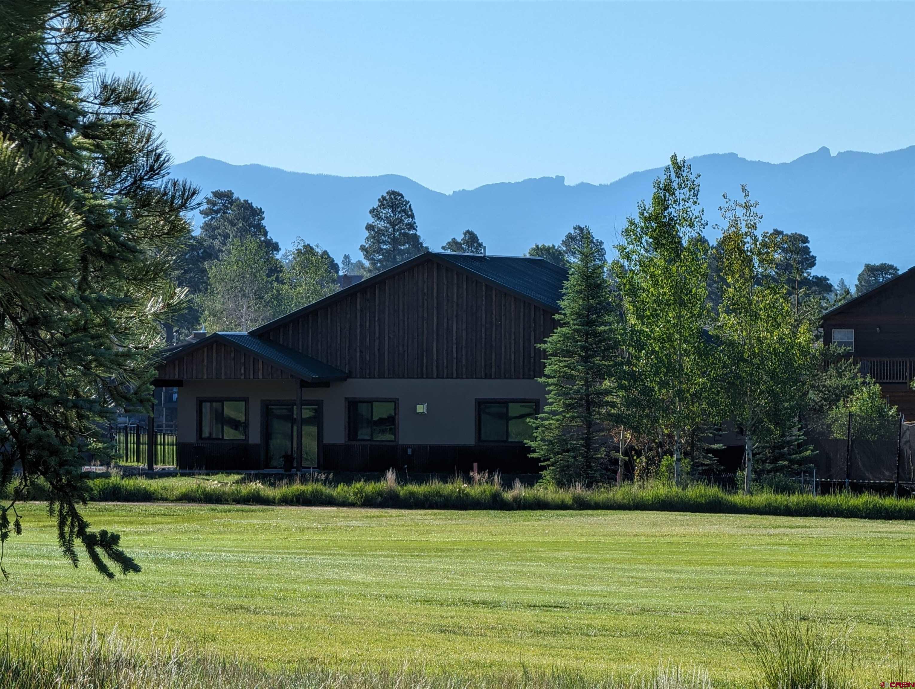 Image 3: early morning on the back side of the home on the golf cours