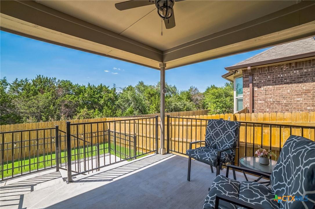 Image 2: Covered Back Patio with greenspace views