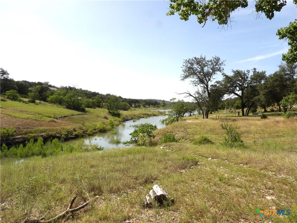 Image 3: July 2026 creek view leading to Canyon Lake