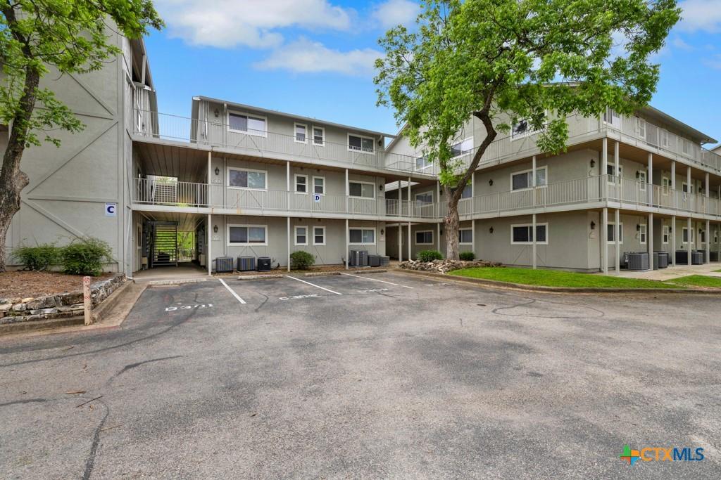 Image 3: Building D, Unit 102 comes with 2 assigned parking