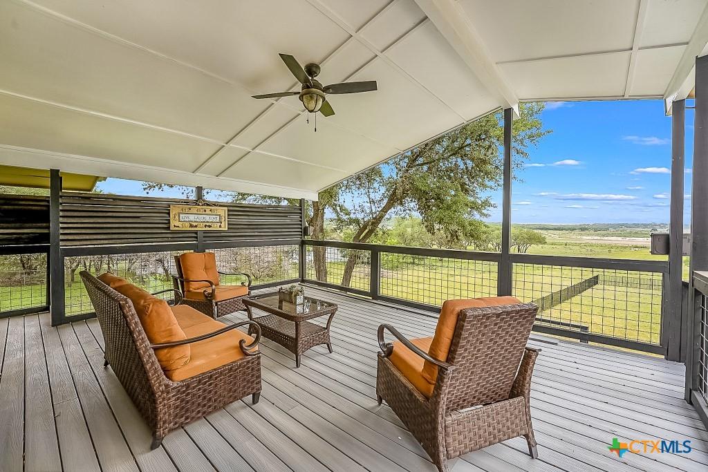 Image 1: Covered Deck off of Kitchen/Living area
