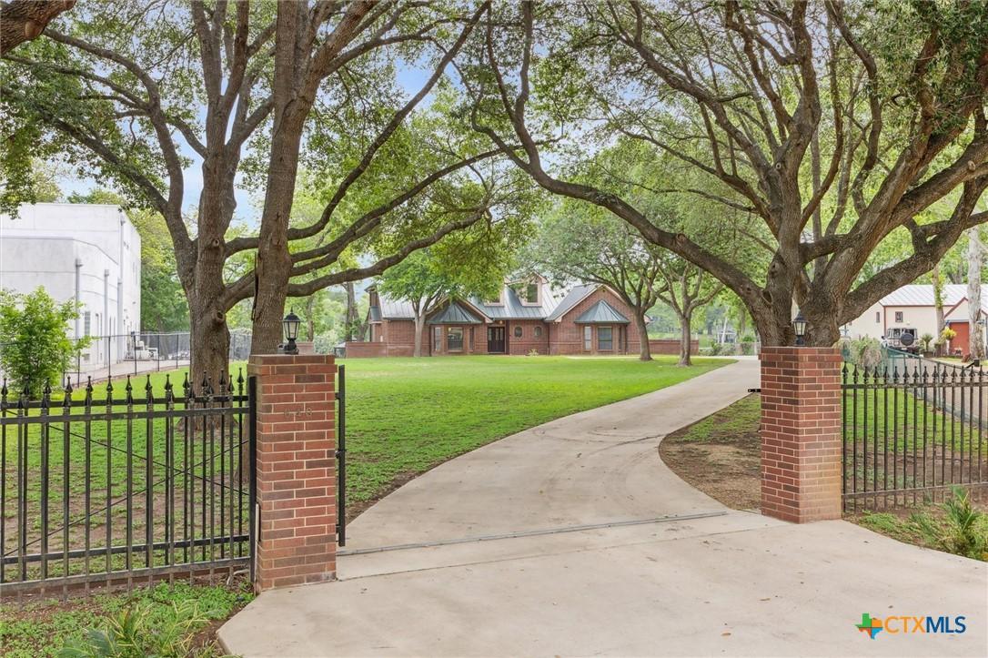 Image 2: Gated front entry.