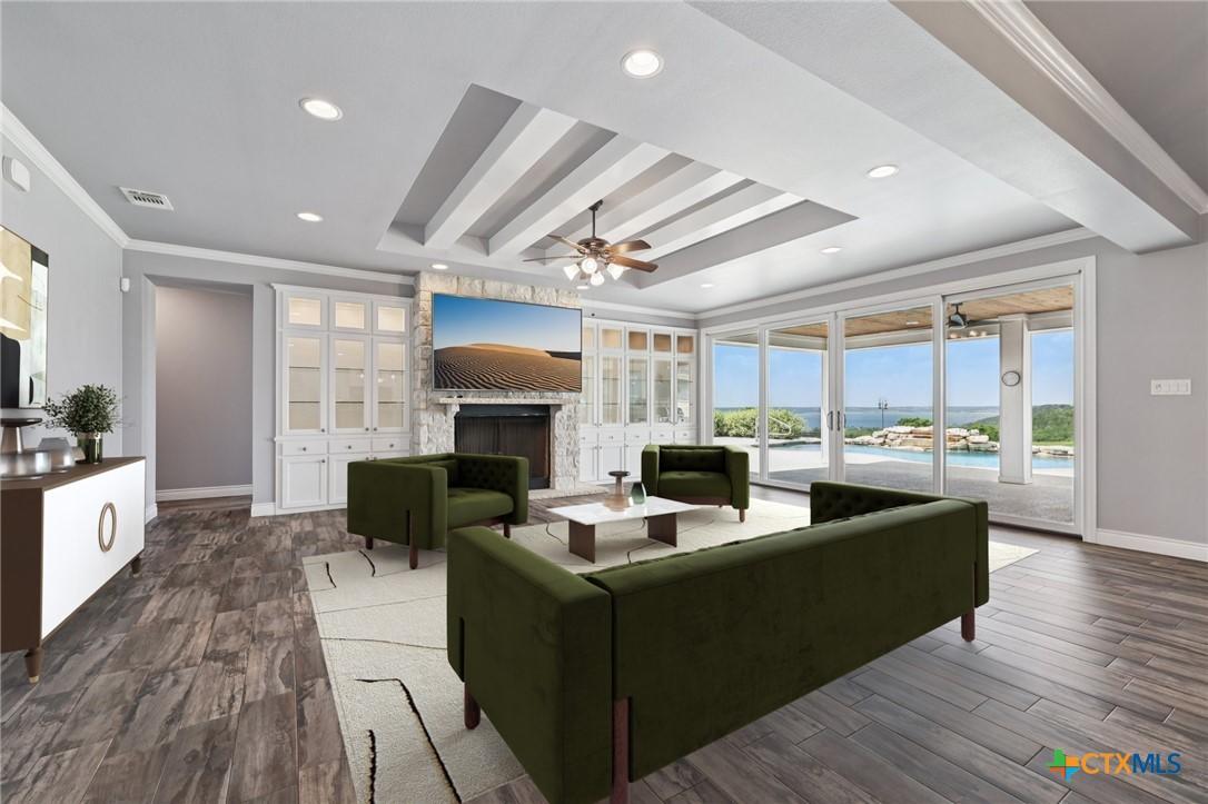 Image 1: Virtually staged living room with a view of the la